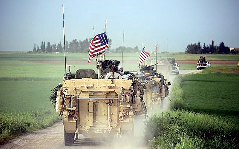 Quân đội Mỹ và các tay súng người Kurd ở Syria. Ảnh: AFP