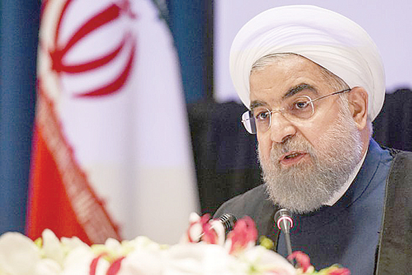 Tổng thống Rouhani sẽ đối mặt với nhiều thách thức nếu thỏa thuận hạt nhân Iran sụp đổ. Ảnh: Reuters