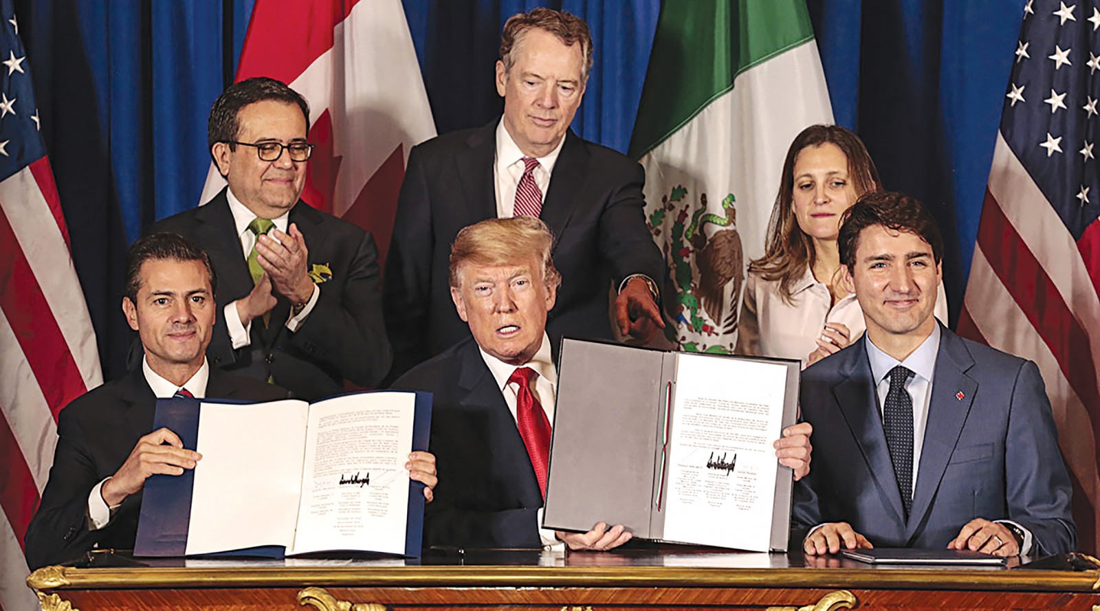 Thỏa thuận USMCA có lợi cho Mỹ và phù hợp với nỗ lực của Tổng thống Trump nhằm cô lập kinh tế Trung Quốc. Ảnh: Global News