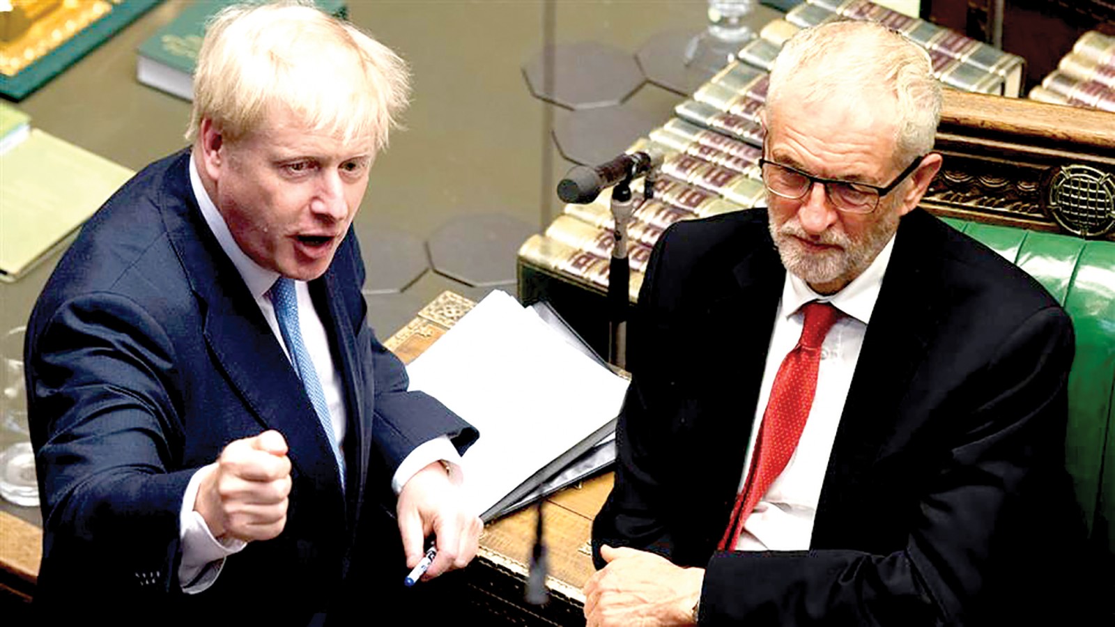 Thủ tướng Johnson (trái) và lãnh đạo Công đảng Corbyn . Ảnh: WSJ