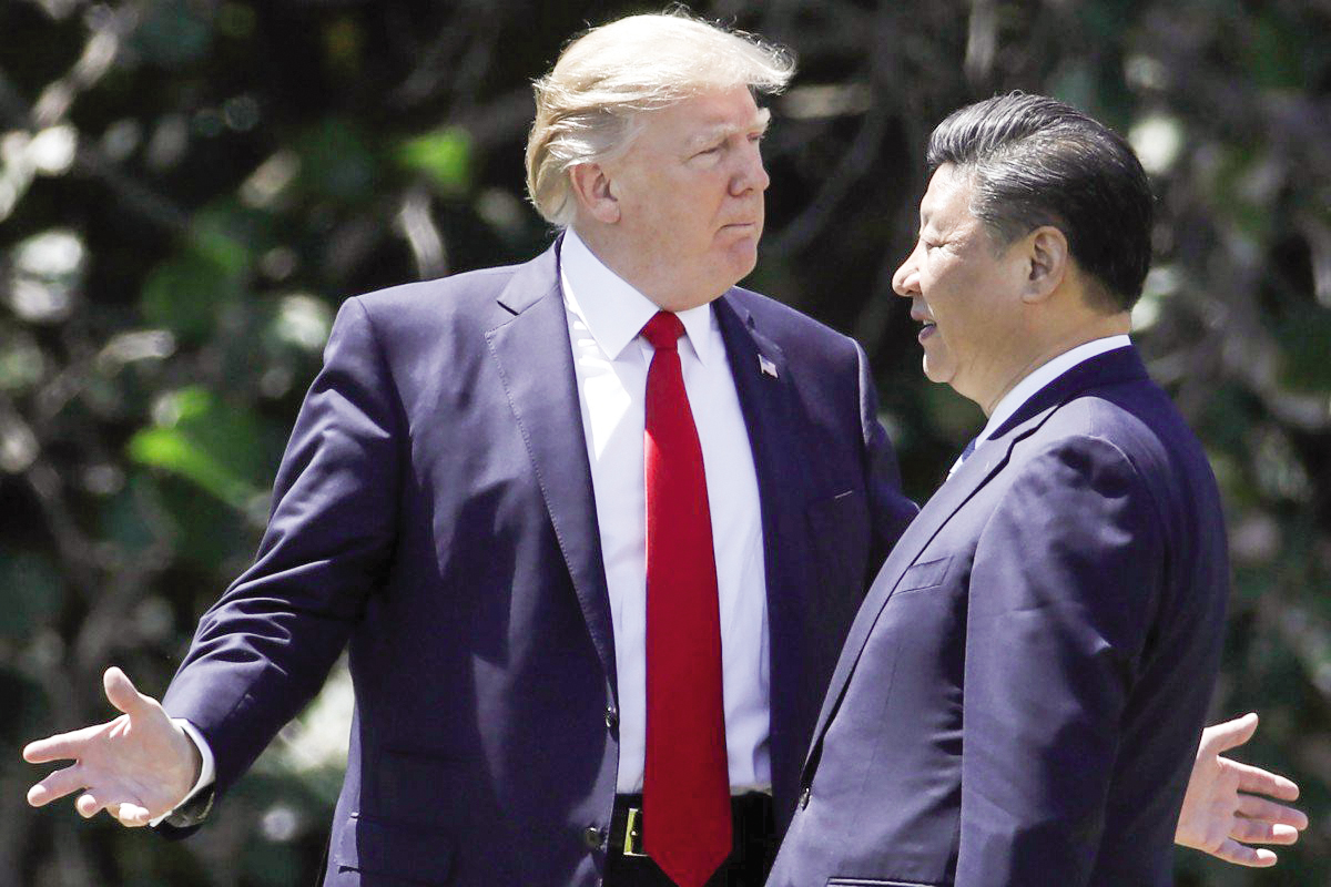 Tổng thống Trump (trái) và Chủ tịch Tập Cận Bình. Ảnh: AP