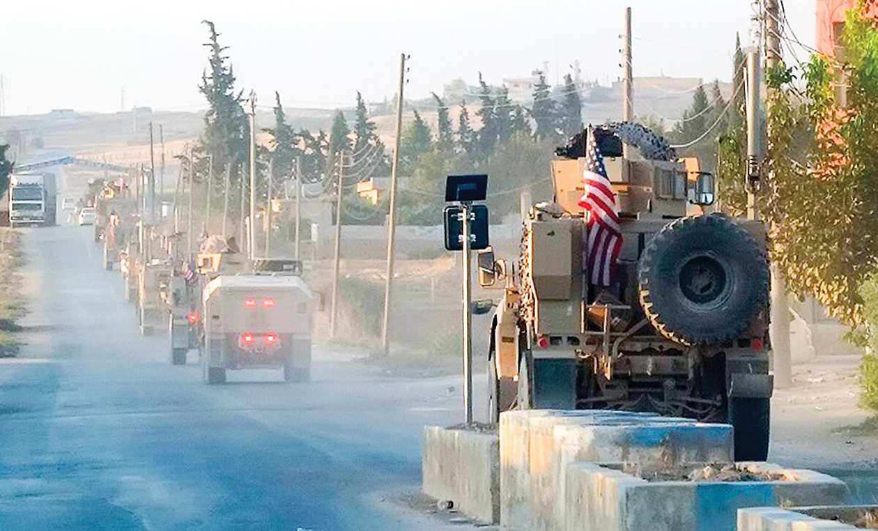 Mỹ rút quân khỏi biên giới Syria Lực lượng Mỹ tại vùng Đông Bắc Syria bắt đầu rút quân từ hôm 7-10. Ảnh: AP