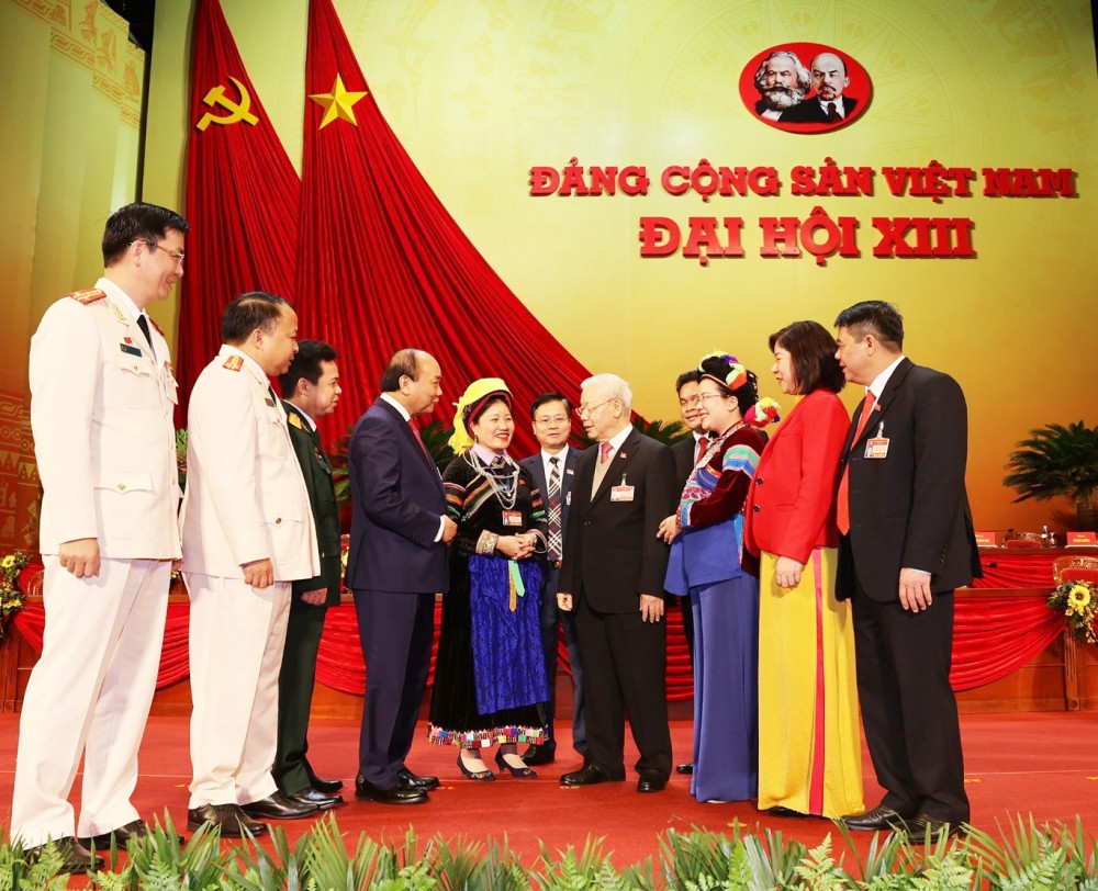 Tổng Bí thư, Chủ tịch nước Nguyễn Phú Trọng và Thủ tướng Chính phủ Nguyễn Xuân Phúc với các đại biểu. Ảnh: TTXVN