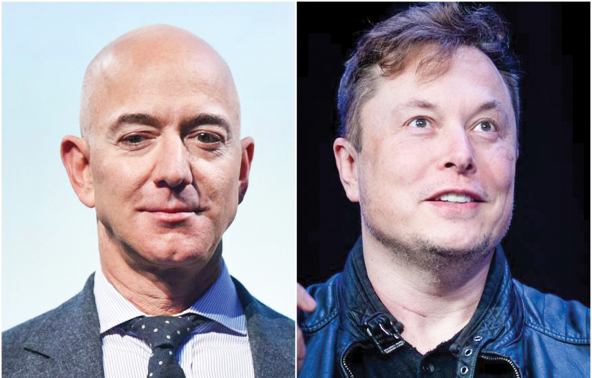 Mỹ sắp đánh thuế các tỉ phú Hai nhân vật giàu nhất thế giới Elon Musk (phải) và Jeff Bezos nằm trong số các tỉ phú Mỹ bị cáo buộc không nộp thuế trong nhiều năm. Ảnh: Getty Images