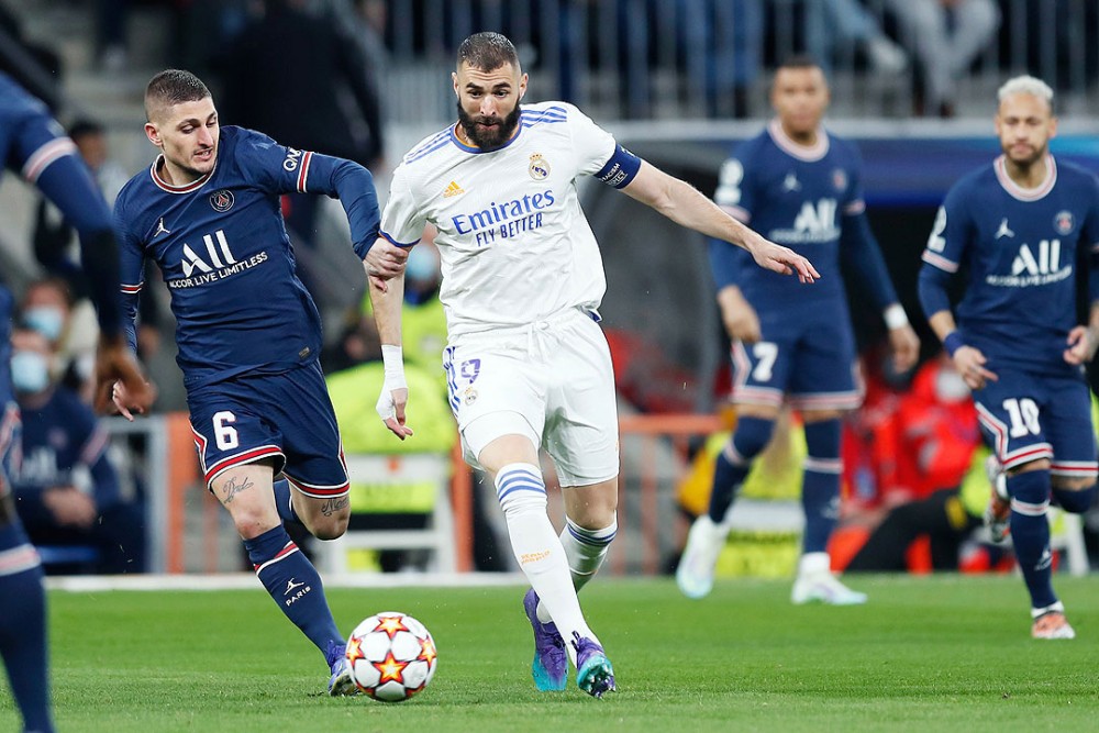 Marco Verratti (số 6) của PSG vất vả đeo bám Benzema ở trận lượt về. Ảnh: Reuters