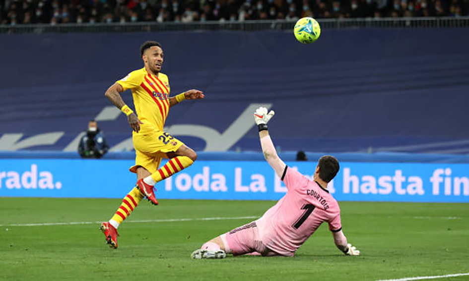 Aubameyang hoàn tất cú đúp bàn thắng vào lưới Real Madrid hôm 20-3. Ảnh: Getty Images