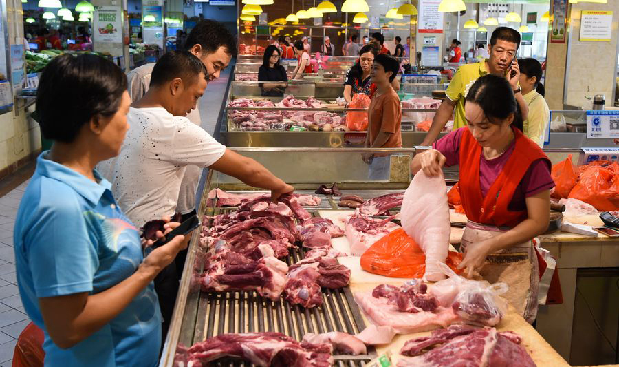 Một quầy bán thịt  heo tại tỉnh Hải Nam, Trung Quốc. Ảnh: Xinhua