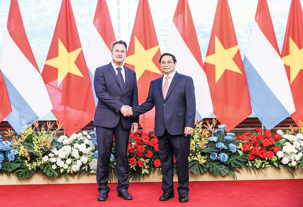 Thủ tướng Phạm Minh Chính hội đàm với Thủ tướng Xavier Bettel Thủ tướng Phạm Minh Chính và Thủ tướng Xavier Bettel chụp ảnh chung. Ảnh: DƯƠNG GIANG - TTXVN