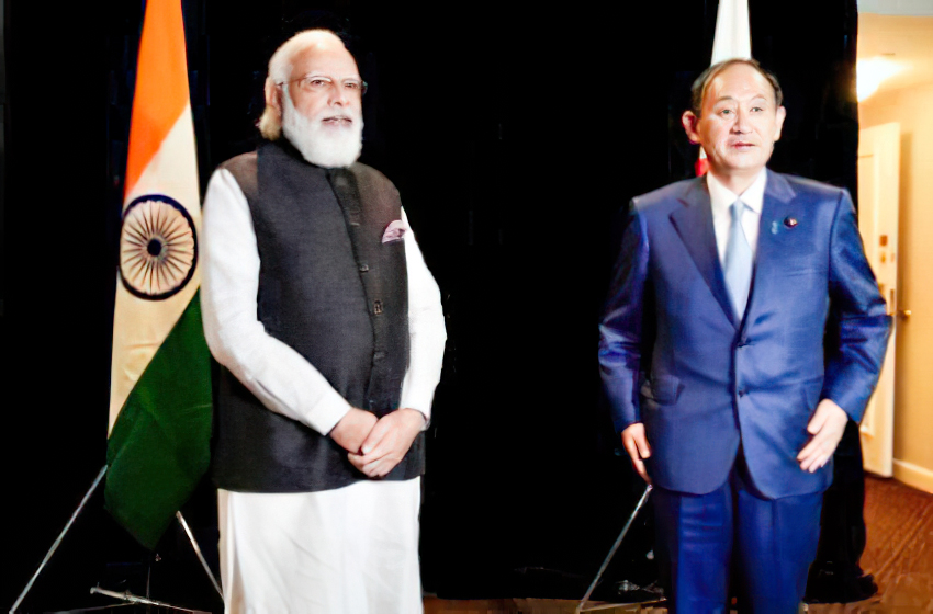 Thủ tướng Ấn Độ Modi (trái) và cựu Thủ tướng Nhật Suga.