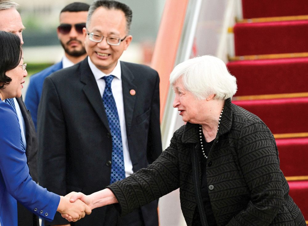 Bà Yellen (phải) tới Trung Quốc ngày 6-7. Ảnh: Reuters