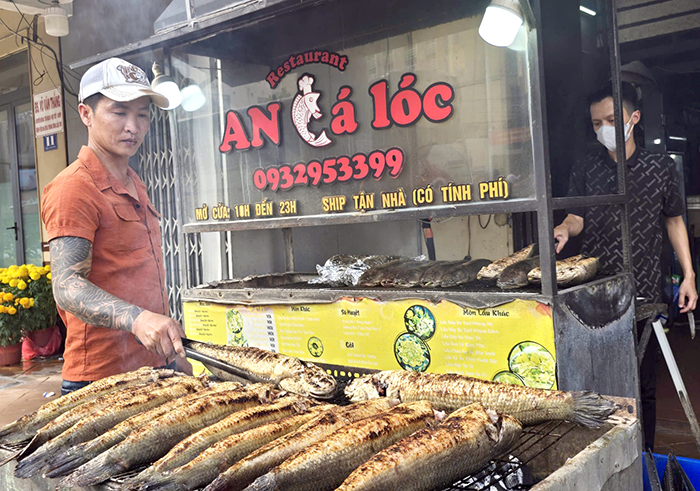 Vì sao mùng 10 Tết vía Thần Tài cúng cá lóc nướng?