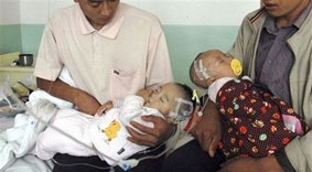 Bắt giữ 19 người liên quan tới sữa nhiễm độc