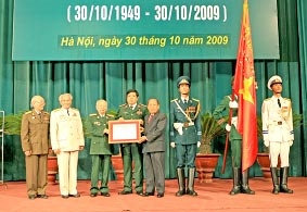 Kỷ niệm 60 năm ngày truyền thống lực lượng Quân tình nguyện và Chuyên gia Quân sự Việt Nam giúp Lào