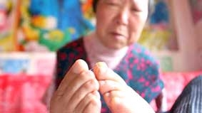 Thợ thêu không tay