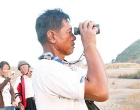 Người đếm <br>
sếu đầu đỏ