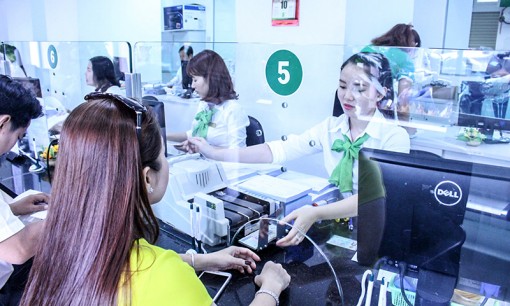 Hạn chế tình trạng đô-la hóa,

nâng cao vị thế của đồng tiền Việt Nam