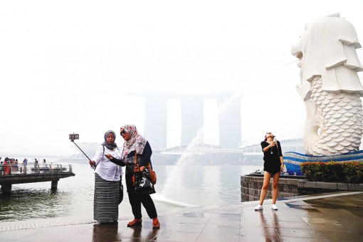Khách du lịch đến Singapore tăng nhờ thượng đỉnh Mỹ - Triều