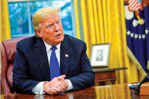 Tổng thống Mỹ ký dự luật ngân sách

và gói cứu trợ COVID-19