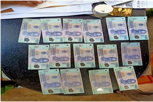 Bắt khẩn cấp đối tượng nghi tàng trữ tiền giả