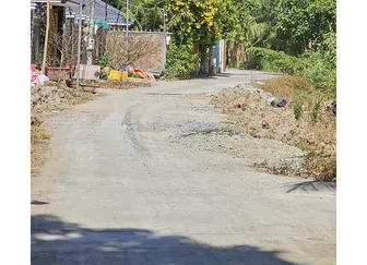 Đoạn đường sụp lún ở rạch Mật Cật đã được giặm vá tạm thời