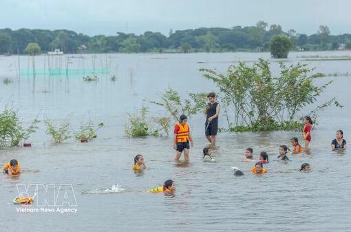 An Giang’s flood season bathing offers unique tourism experience